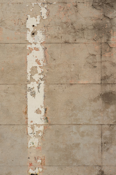 旧的脏的米色混凝土砌块墙的一部分图片下载