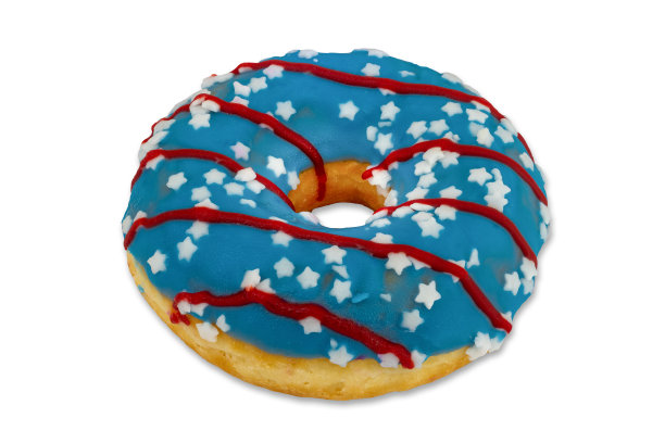 可口的白色星星和红色条纹在白色背景上的蓝色糖霜甜甜圈图片下载