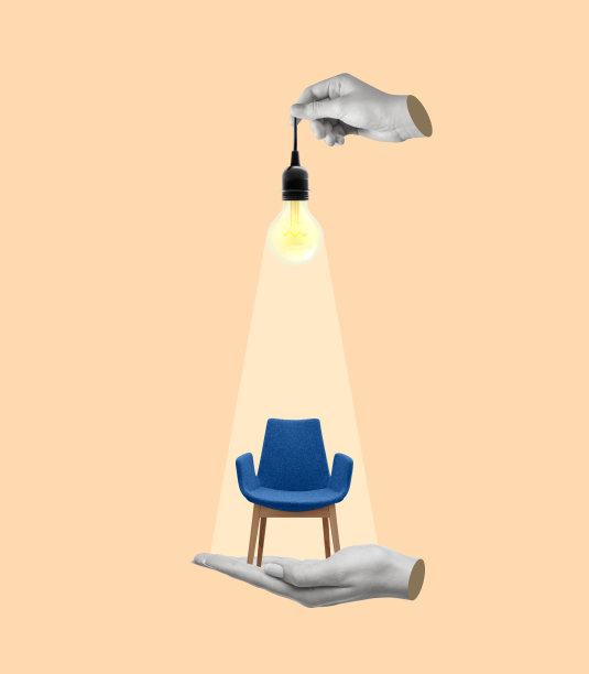 一只手拿着办公室椅子上的灯泡。图片下载