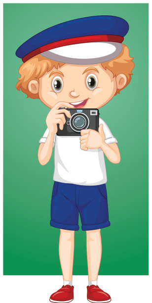 带着数码相机的快乐男孩图片下载