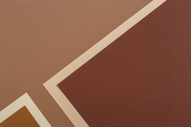 彩色纸几何组成的背景与米色和棕色色调图片下载
