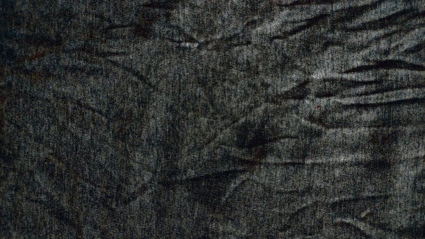 特写皱巴巴的加热器和运动服或有纹理织物背景的连帽衫图片下载