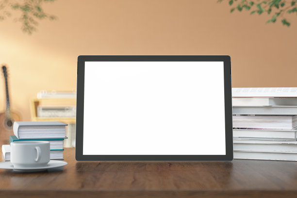 数码平板电脑模型和复制空间在桌面模糊舒适的客厅图片下载