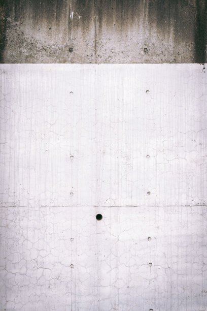 白色边缘的混凝土墙。图片下载