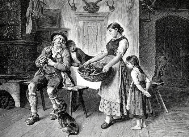 一家人在瓷砖炉前欣赏腊肠小狗图片下载