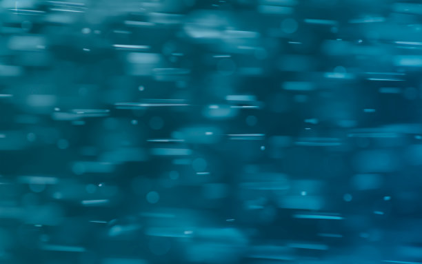 海军蓝模糊闪光背景。图片下载