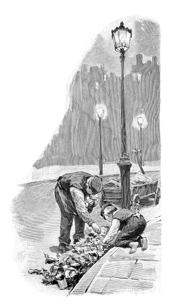 巴黎，清晨用手推车收集垃圾图片下载