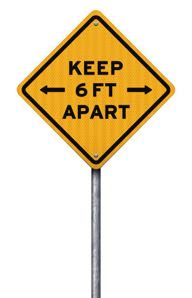 黄色社交距离冠状病毒警告标志与金属柱图片下载