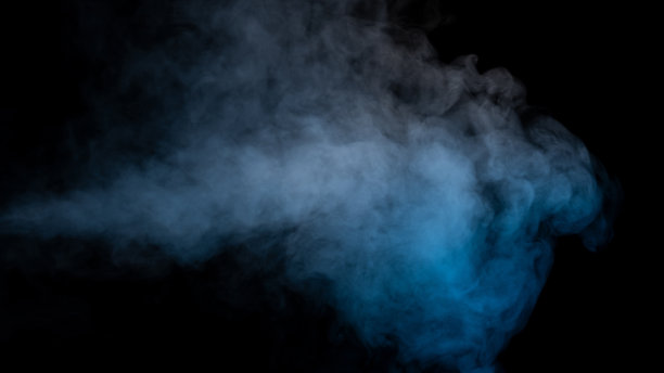 蓝色和黄色蒸汽在黑色的背景。图片下载