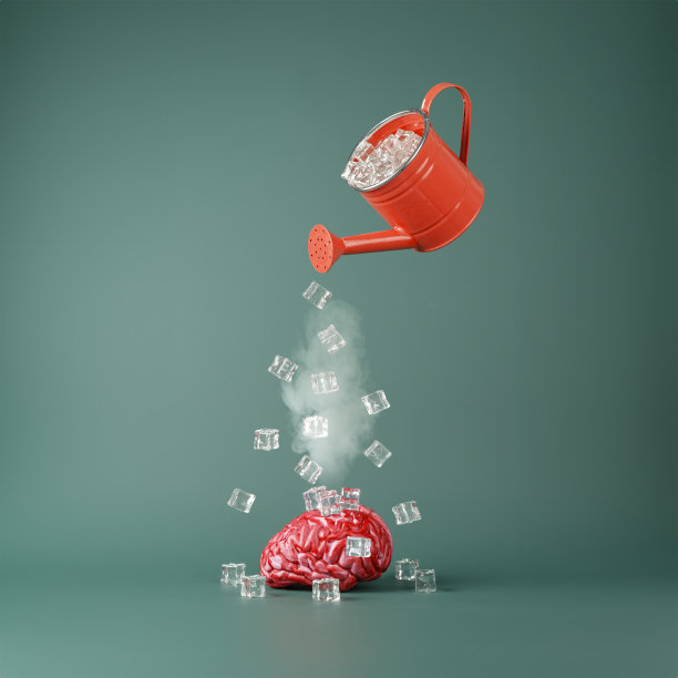 心理健康概念。红色的喷壶将冰块洒在被加热的大脑上。图片下载
