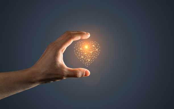 人工智能的心脏符号在黑暗的背景上在手图片下载