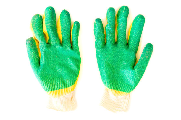 手套花园清洁和维修工作在一个白色孤立的背景。图片下载