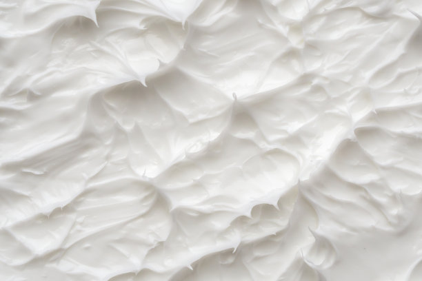 白色化妆水美容护肤霜质地化妆品背景图片下载