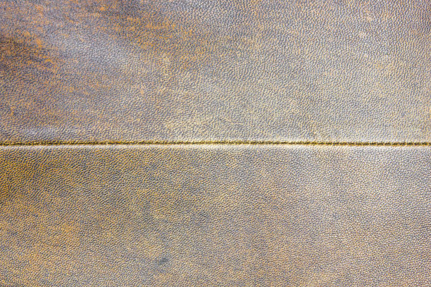 真正的棕色皮革。缝纫材料皮革。真品真皮表面、纹理、底色。图片下载