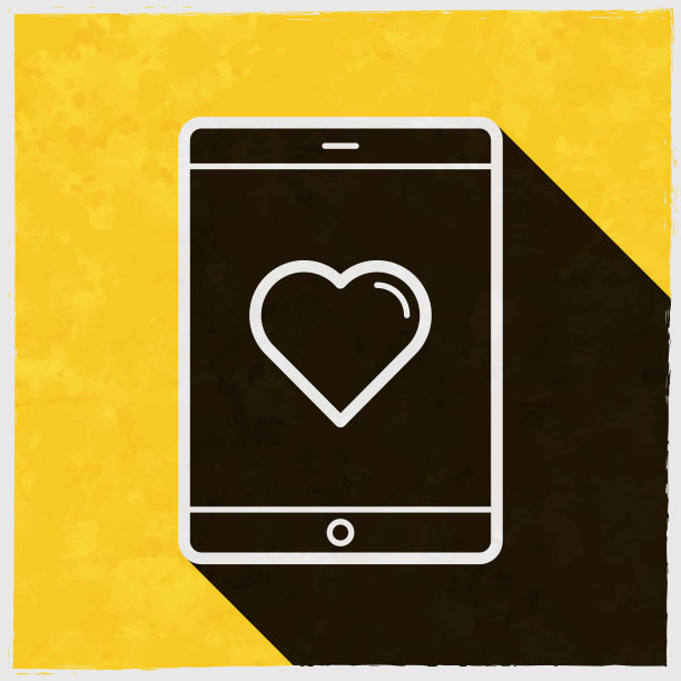 平板电脑用心。图标与长阴影的纹理黄色背景图片下载