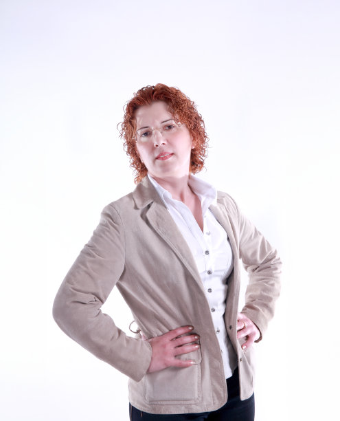 卷曲的红头发白色的商人肖像在白色的背景图片下载