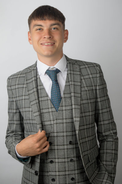 穿着西装、领带和马甲的年轻企业家图片下载