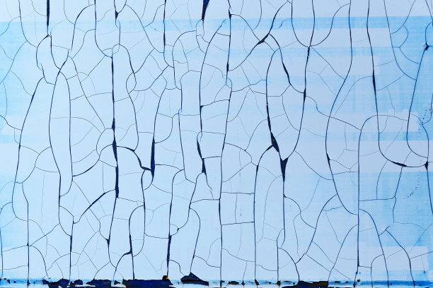 近距离的蓝色墙壁，油漆剥落图片下载