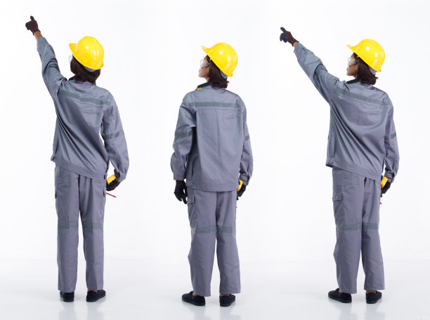 全长20多岁的年轻亚洲行业女性戴着安全帽保护装备，手指在空中的手图片下载