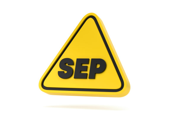 黄色三角形警告形状和九月日历图片下载