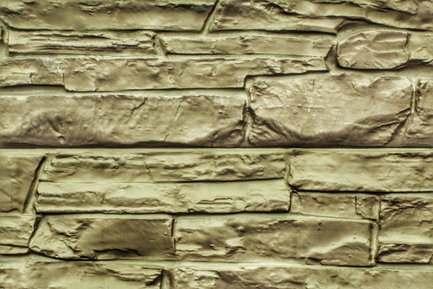 装饰花岗石、鹅卵石、石瓦、砖墙纹理背景。无缝图案背景。精心制作的现代砖墙外墙。房屋外部用砂岩砌块瓷砖图片下载