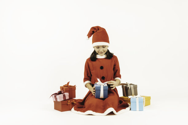 穿着圣诞老人服装的小女孩图片下载