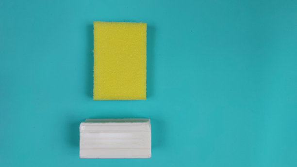 黄色的清洁海绵和白色的肥皂图片下载