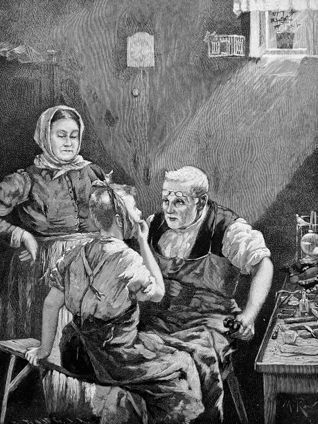 男孩在看牙医或铁匠图片下载