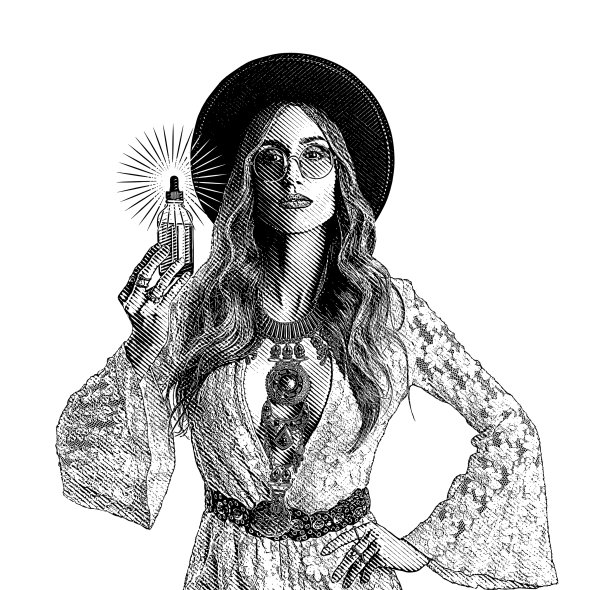 拿着一瓶CBD油的波西米亚女人图片下载