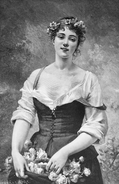 年轻漂亮的女人用新鲜的玫瑰装饰图片下载