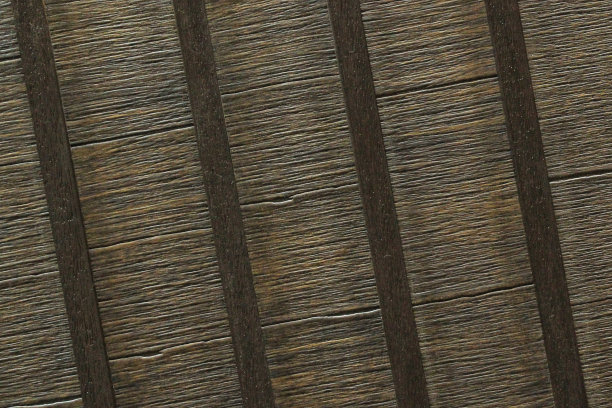 木质横梁的纹理。彩色木板墙。棕色的栅栏。室内板条背景。电路板的结构。建筑条纹板图片下载