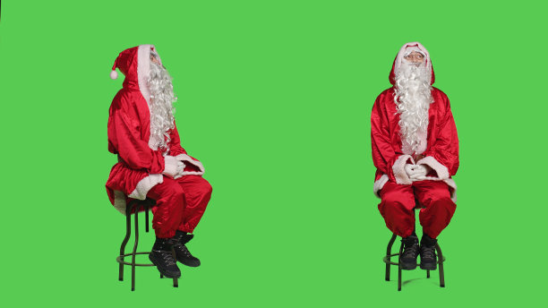 椅子上有人打扮成圣诞老人图片下载