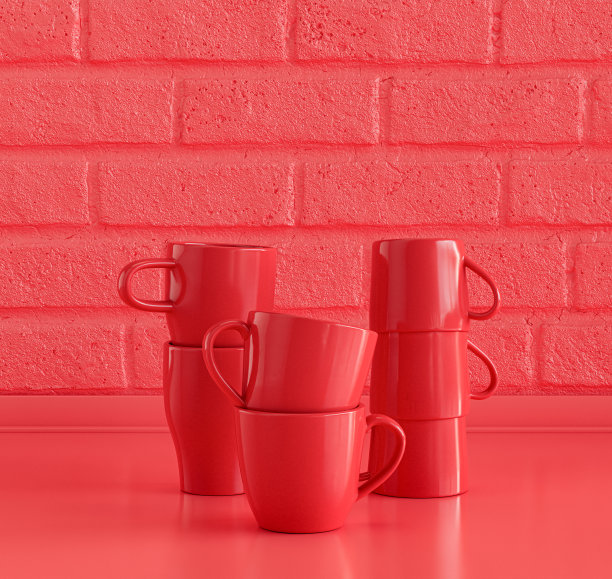 红色的咖啡杯堆叠在厨房的工作台上，砖墙，没有人图片下载