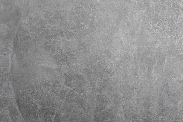 灰色的石头背景与纹理和轻微的表面浮雕图片下载