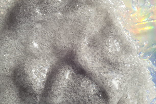 涂在彩色背景上的一抹浆糊。美的概念。图片下载