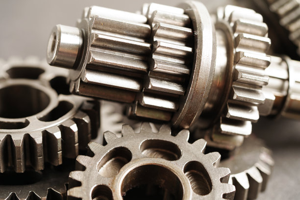 金属齿轮发动机汽车和自行车，机械工业的概念。图片下载