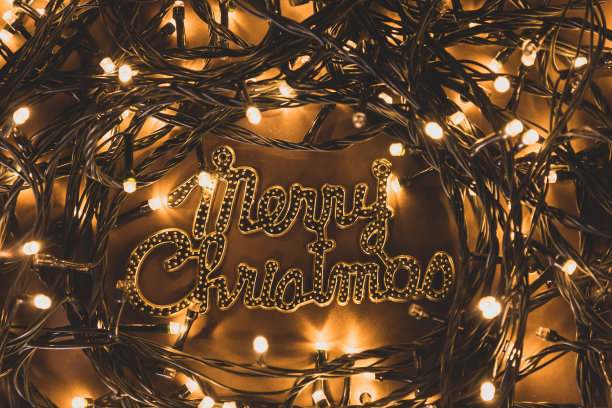 圣诞灯饰与礼盒金星，模糊特写图片下载