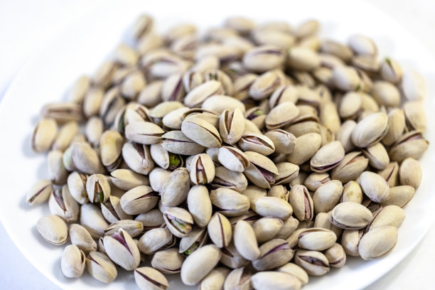 特写烤和咸澳大利亚开心果图片下载