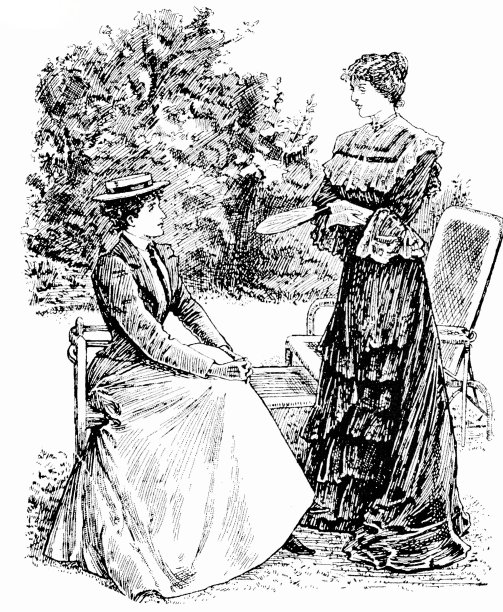 两个年轻优雅的女人在花园里聊天，一个坐着，一个站着图片下载