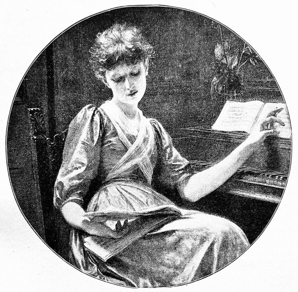 年轻女孩在钢琴前练习新歌图片下载