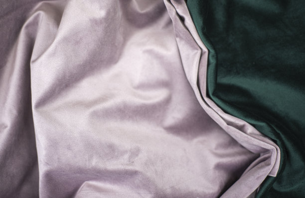 翡翠和粉红色的褶皱天鹅绒背景图像，绿色和粉红色的丝绸织物为背景网页设计壁纸，绿色和粉红色的纺织品背景的美丽组合图片下载