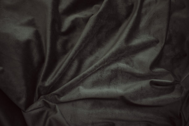 黑色纺织品背景，棕褐色天鹅绒与折叠背景图像，深色织物丝绸为背景网页设计壁纸，图片下载
