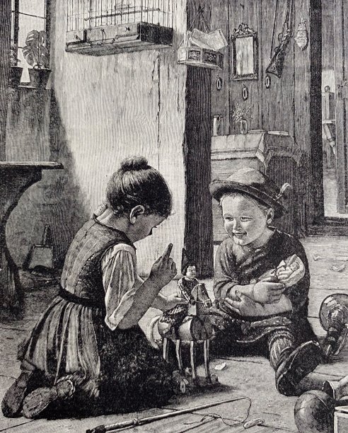 哥哥和妹妹在房间的地板上玩，玩得很开心图片下载