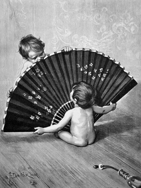 两个婴儿在地板上玩手扇图片下载