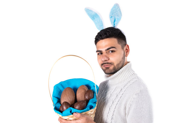 年轻迷人的学生在复活节打扮成兔子。图片下载