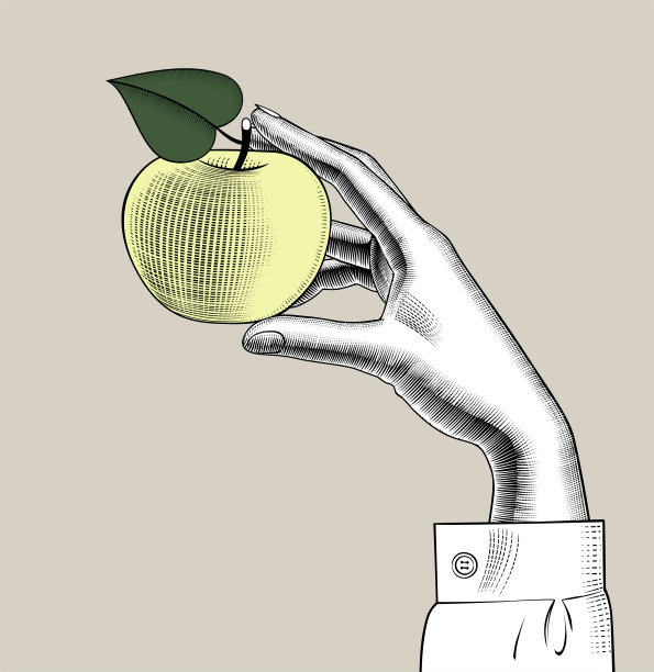 女人手里拿着黄苹果。图片下载