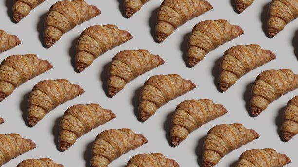 新鲜出炉的牛角面包，俯视图。早餐面包食品牛角面包。三维渲染图片下载