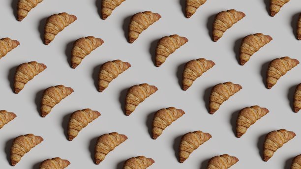 新鲜出炉的牛角面包，俯视图。早餐面包食品牛角面包。三维渲染图片下载