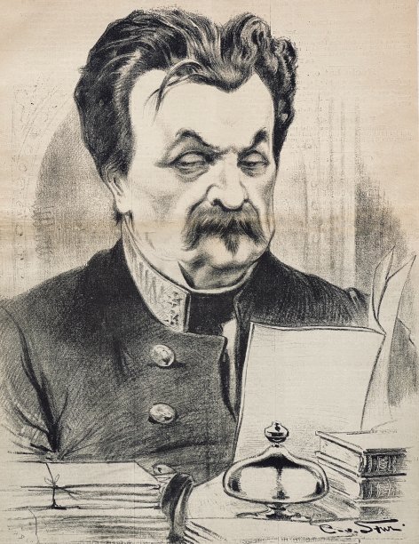 长着胡子的老人坐在书桌前仔细地读着一封信图片下载