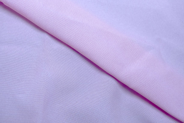 粉红色和紫色布料纺织背景。图片下载